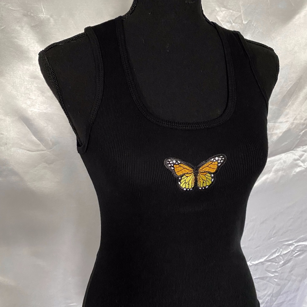 Black tank top with yellow butterfly